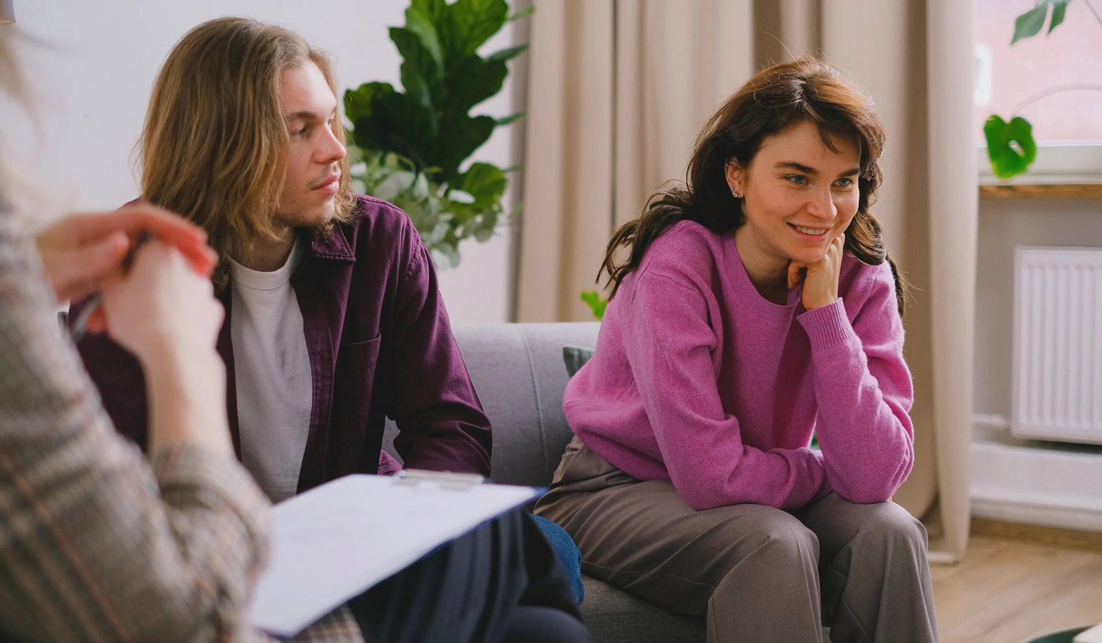 Two women talking in a bright consulting room