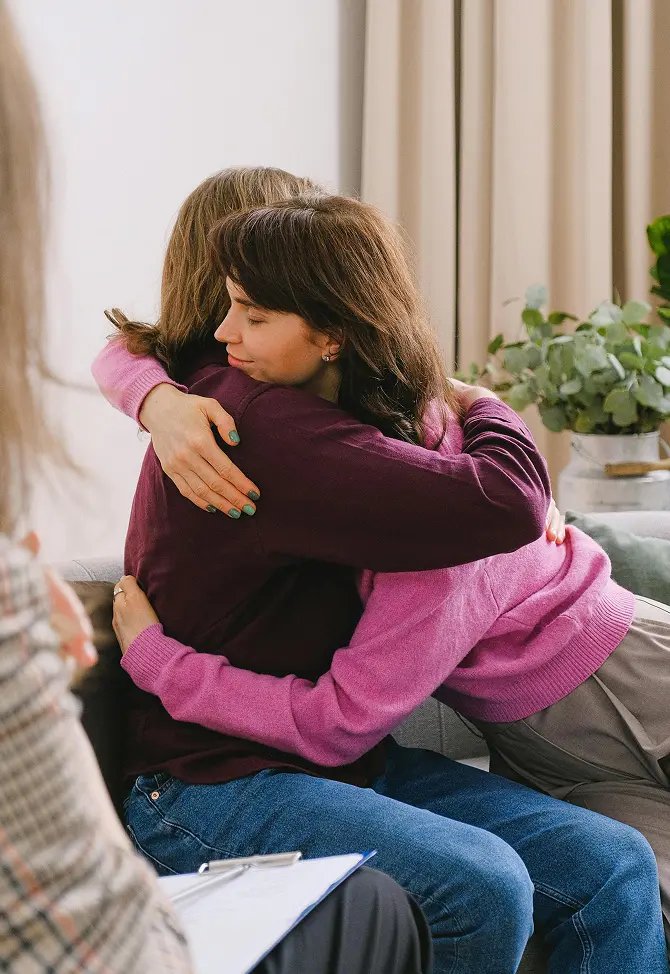 Two people embracing